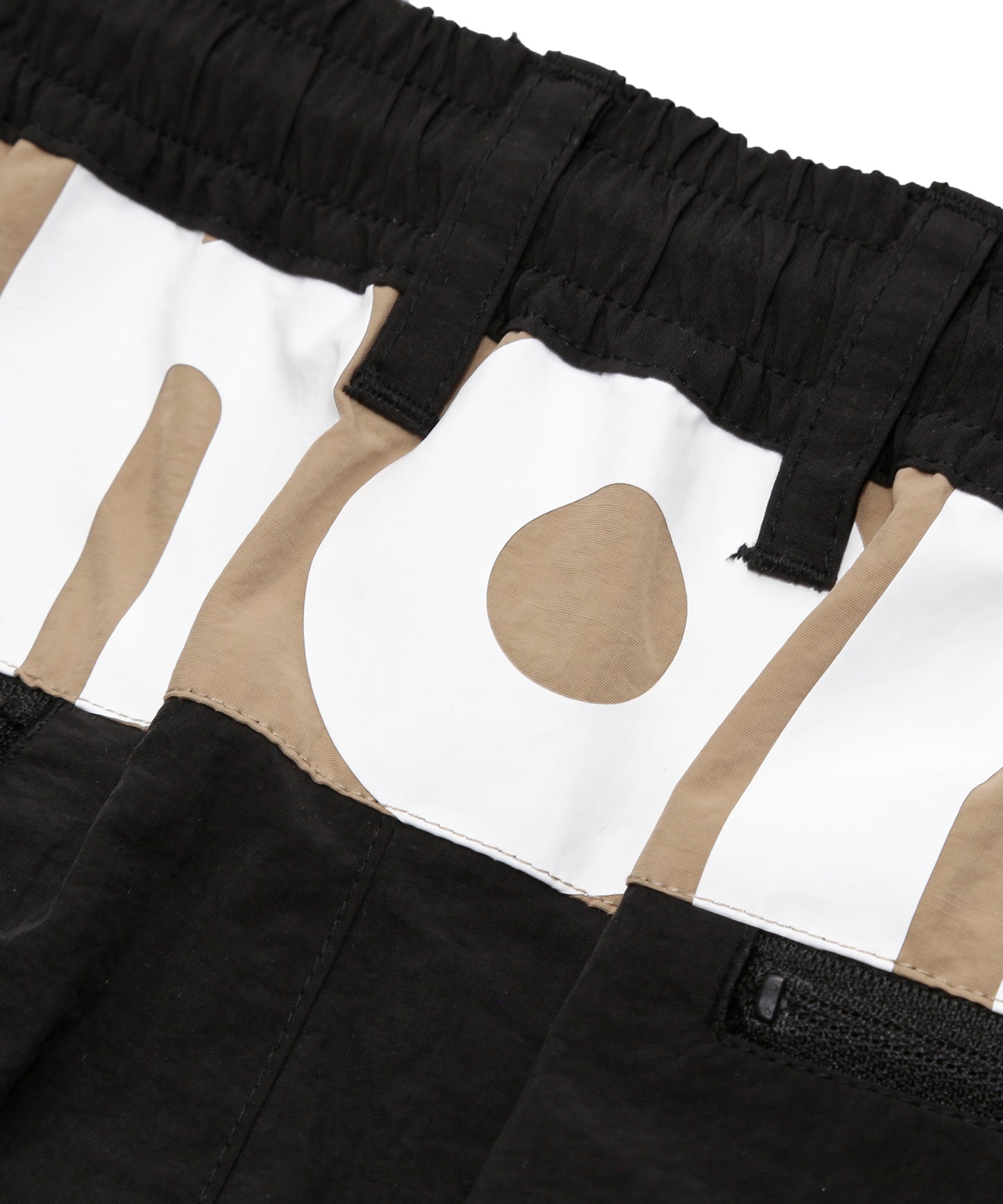 BACK SWITCHING NYLON PANTS